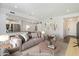 Bright living room with elegant decor, open floor plan, and access to dining and kitchen area at 11762 E Becker Ln, Scottsdale, AZ 85259