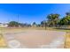 Outdoor basketball court offering recreational opportunities for residents, with tennis court and picnic pavilions in the background at 13408 N 25Th Dr, Phoenix, AZ 85029