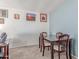 Inviting dining area with a classic dark wood table and chairs at 13408 N 25Th Dr, Phoenix, AZ 85029
