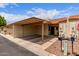 Charming home featuring a carport and well-maintained landscaping at 13408 N 25Th Dr, Phoenix, AZ 85029