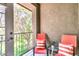 Outdoor balcony featuring seating with striped pillows and a view at 14250 W Wigwam Blvd # 2722, Litchfield Park, AZ 85340