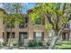 Charming two-story condo with well-maintained landscaping and a small balcony, ideal for enjoying the outdoors at 14250 W Wigwam Blvd # 2722, Litchfield Park, AZ 85340