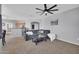 Open concept living room that leads to the kitchen featuring contemporary decor and design at 14250 W Wigwam Blvd # 2722, Litchfield Park, AZ 85340