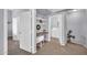Cozy office space with built-in shelves, desk, and nearby laundry room, perfect for focused work at 14250 W Wigwam Blvd # 2722, Litchfield Park, AZ 85340