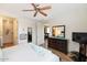 Bright bedroom with hard wood floors, a ceiling fan, and lots of natural light at 14815 N Fountain Hills Blvd # 101, Fountain Hills, AZ 85268
