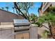 Built-in stainless steel outdoor grill set in landscaped surroundings, perfect for outdoor cooking at 14815 N Fountain Hills Blvd # 101, Fountain Hills, AZ 85268