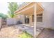 Private backyard with covered patio, sliding glass door, and air conditioning unit at 16021 N 30Th St # 122, Phoenix, AZ 85032