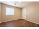 Bedroom with hard surface floors and a window allowing natural light at 16021 N 30Th St # 122, Phoenix, AZ 85032