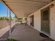 The covered patio is furnished with a table and chairs at 16215 N 35Th Way, Phoenix, AZ 85032