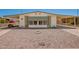 Charming single-story home with rock landscaping and covered parking at 16215 N 35Th Way, Phoenix, AZ 85032
