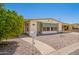 Inviting single-story home with awning, walkway, and desert-friendly landscaping at 16215 N 35Th Way, Phoenix, AZ 85032