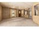 Spacious living room featuring carpet floors and ample natural light at 16215 N 35Th Way, Phoenix, AZ 85032