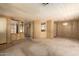 Spacious living room featuring carpet floors and ample natural light at 16215 N 35Th Way, Phoenix, AZ 85032