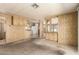 Spacious living room featuring carpet floors and ample natural light at 16215 N 35Th Way, Phoenix, AZ 85032