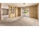 Spacious living room with sliding glass door to the outdoors at 16215 N 35Th Way, Phoenix, AZ 85032