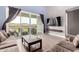 Comfortable living room with sliding doors leading to the patio, perfect for indoor-outdoor living at 16539 W Winston Dr, Goodyear, AZ 85338