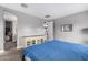 Spacious main bedroom with carpet and a dresser with glass display at 16539 W Winston Dr, Goodyear, AZ 85338
