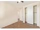 Cozy bedroom with closet and well-maintained tile flooring at 17506 W Hadley St, Goodyear, AZ 85338