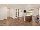 Open kitchen layout featuring a walk-in pantry, stainless steel appliances, and a center island at 17506 W Hadley St, Goodyear, AZ 85338