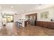 Spacious open floor plan with kitchen island, stainless steel appliances, and easy access to outdoor living at 17506 W Hadley St, Goodyear, AZ 85338