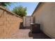 The property has a private side yard with gravel, a shed, and an AC unit at 17506 W Hadley St, Goodyear, AZ 85338