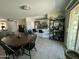 Bright dining area with an open layout to the kitchen, perfect for entertaining guests and enjoying meals at 2007 N 55Th Ln, Phoenix, AZ 85035