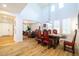 Elegant dining room boasts high ceilings, ample natural light, and a spacious table for entertaining at 20639 W Grandview Dr, Buckeye, AZ 85396