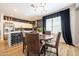 Eat-in kitchen with a modern chandelier, and sleek countertops at 20639 W Grandview Dr, Buckeye, AZ 85396