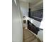 Bright staircase with wrought iron railings and neutral carpet on the steps at 20639 W Grandview Dr, Buckeye, AZ 85396