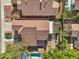Aerial view of the property showcasing the pool, covered patio, and well-maintained landscaping at 2114 E Escuda Rd, Phoenix, AZ 85024
