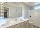 This bathroom boasts dual sinks and vanities, along with a shower and tub at 2114 E Escuda Rd, Phoenix, AZ 85024