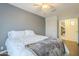 This bedroom offers a neutral decor and closet for storage at 2114 E Escuda Rd, Phoenix, AZ 85024