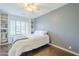 This bedroom features built-in shelving and bright, natural light from the window at 2114 E Escuda Rd, Phoenix, AZ 85024