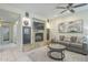 Beautiful living room with fireplace, tile floor, and comfortable seating at 2114 E Escuda Rd, Phoenix, AZ 85024