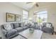 Inviting living room featuring a large window and plenty of natural light at 2114 E Escuda Rd, Phoenix, AZ 85024