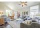 Living room and dining area with large window and comfortable seating at 2114 E Escuda Rd, Phoenix, AZ 85024