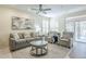 Cozy living room with neutral tones, comfortable seating, and plenty of natural light at 2114 E Escuda Rd, Phoenix, AZ 85024