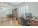 This home office boasts a closet for storage and a built-in desk at 2114 E Escuda Rd, Phoenix, AZ 85024