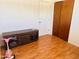 Bedroom featuring modern sliding-door closet and a wood storage console at 2115 W Myrtle Ave, Phoenix, AZ 85021