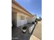 Charming home exterior featuring a brick facade and cozy front porch with white pillars at 2115 W Myrtle Ave, Phoenix, AZ 85021