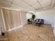 Bright living room with tile floors, providing a comfortable and stylish space at 2115 W Myrtle Ave, Phoenix, AZ 85021