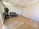 Open Living room with tile floors and plenty of natural light at 2115 W Myrtle Ave, Phoenix, AZ 85021