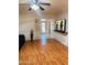 Spacious living room featuring wood floors and plenty of natural light at 2115 W Myrtle Ave, Phoenix, AZ 85021