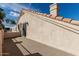 Spacious balcony showcasing the home's roof line with red tile and stucco siding at 2134 W Peninsula Cir, Chandler, AZ 85248