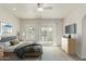 Bedroom showcasing a ceiling fan and sliding glass doors to a scenic outdoor view at 2134 W Peninsula Cir, Chandler, AZ 85248