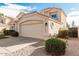 Attractive single-story home showcasing desert landscaping and a convenient two-car garage at 2134 W Peninsula Cir, Chandler, AZ 85248