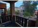 Overlooking manicured grounds from the balcony, the view showcases the appealing community and building exteriors at 2150 W Alameda Rd # 1109, Phoenix, AZ 85085
