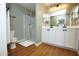 Clean bathroom with tiled floors, glass-enclosed shower, and double vanity at 2150 W Alameda Rd # 1109, Phoenix, AZ 85085