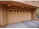 Garage with a beige garage door and the house number 1109 above the door at 2150 W Alameda Rd # 1109, Phoenix, AZ 85085