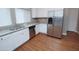 The kitchen features stainless steel appliances, granite countertops, and tiled floors at 2150 W Alameda Rd # 1109, Phoenix, AZ 85085